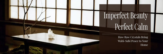 A wabi-sabi room with clear quartz and driftwood in it. With this blog title: imperfect beauty, perfect calm, how raw crystals bring wabi-sabi peace to your home