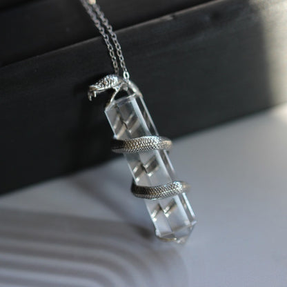 Sterling Silver Serpent-Wrapped Clear Quartz Pendant: A Mystical Amulet