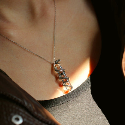 Sterling Silver Serpent-Wrapped Clear Quartz Pendant: A Mystical Amulet